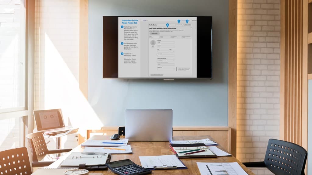 Design roadshow presentation displayed in a conference room setting